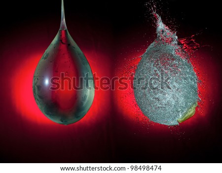 The balloon full of water is frozen before and in the moment of its explosion on the red gradient background. High speed photography