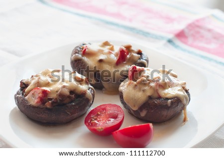 Stuffed mushrooms with cheese.