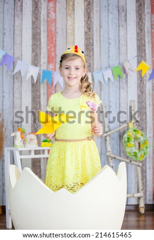 beautiful girl in the yellow chicken costume