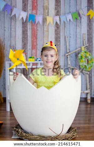 beautiful girl in the yellow chicken costume