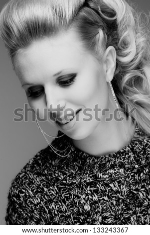 Close up of attractive smiling girl, black and white image, vertical format