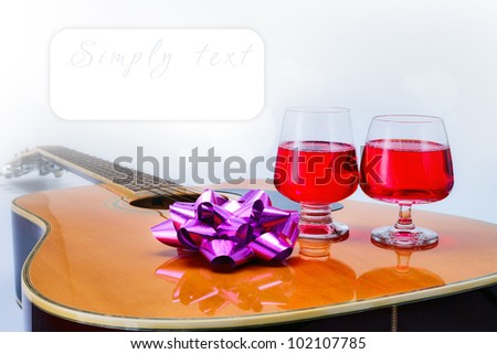 Celebrate the day  with Folk Guitar and Two wine glasses simply text