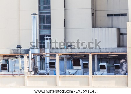 smoke food factory exterior cooker hood ,	building background in Thailand,gray tone and smoke