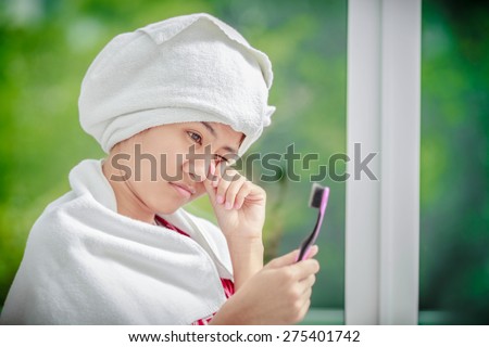 Poor Young Asian Woman skin clean  beautiful Eyes wake up call looking toothbrush  ,lazy brushing teeth background morning bokeh
