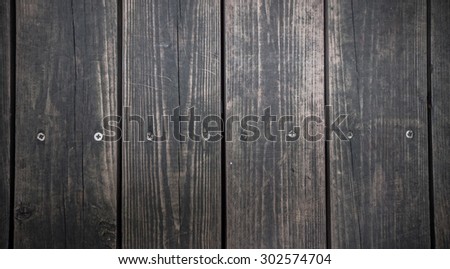Natural dark wood texture strong with nail background ,old wood dark natural