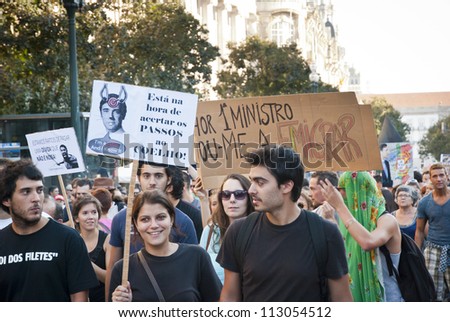 PORTO, PORTUGAL - SEPTEMBER 15: People protesting against government spending cuts and tax rises in Aliados square, Porto on September 15, 2012 in Porto, Portugal