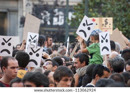 PORTO, PORTUGAL - SEPTEMBER 15: People protesting against government spending cuts and tax rises in Aliados square, Porto on September 15, 2012.