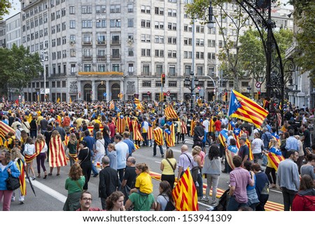 BARCELONA, SPAIN - SEPTEMBER 11: People joining the human chain 