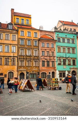 WARSAW, POLAND - NOVEMBER 10: Main square in Warsaw with artists exhibit and selling their work on November 10, 2014