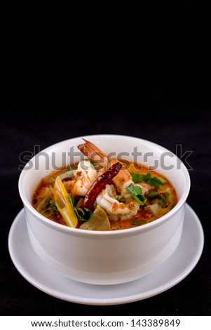Tom yum or tom yam  is a spicy clear soup typical in Laos and Thailand.