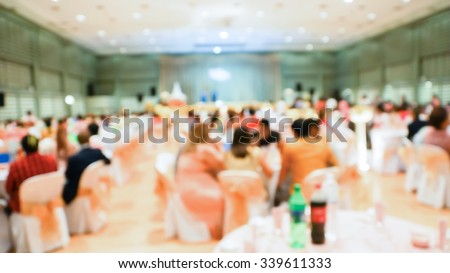 Blurry scene of Chinese round table feast in wedding ceremony