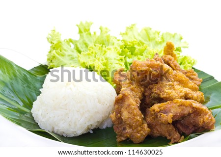 delicious thailand breakfast, sticky rice with Fried chicken on white background