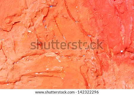 Detailed orange acrylic color abstract artwork painting on stretched canvas for design