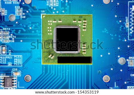 circuit board with micro chip electronic components macro background