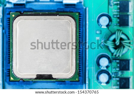 circuit board with microprocessor chip electronic components macro background