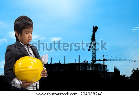 construction site silhouetted on daytime blue sky