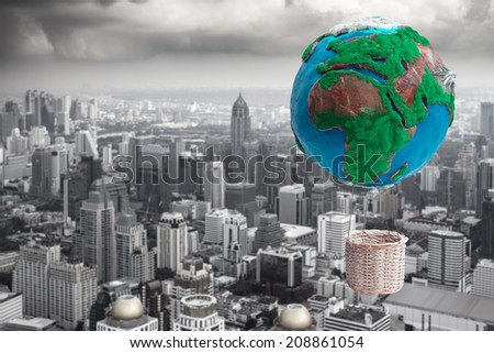 globe hot air balloon basket in ecology concept against urban scene dusky before rain falling
