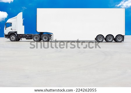 commercial delivery cargo container white truck against blue sky background