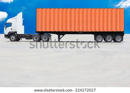 commercial delivery cargo container truck against blue sky