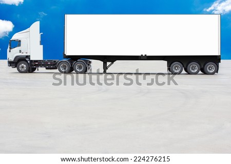commercial delivery cargo container truck with white trailer blank for design against blue sky