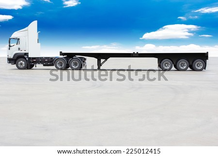 commercial delivery cargo truck with trailer blank for design against blue sky