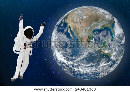 Astronaut floating in space and Earth background. Elements of this image furnished by NASA