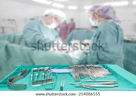 Equipment tools for surgeons who need to operate a patient in an operation room arranged on a table for a surgery of surgeon in operating room