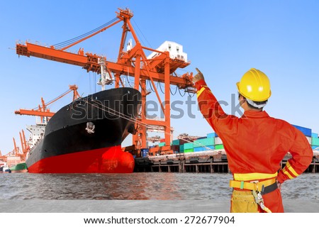 commercial ship loading container with dock worker controlling work process in shipping port export nautical vessel transport and industry logistic
