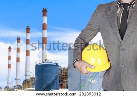 Engineer with helmet in action at modern thermal power plants