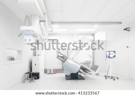 Modern x-ray machine and Computerized Axial Tomography scanning and diagnostic medical equipment in the operating room data center