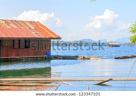 Floating house on the Vajiralongkorn Dam at Kanjanburi, Thailand