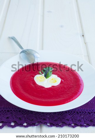 Cold summer Beets soup in the white plate on the white background