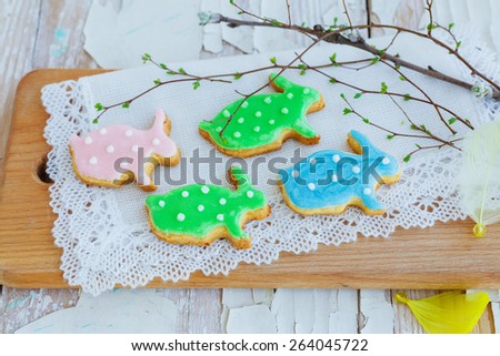 Easter homemade bunny orange cookie over white wooden table