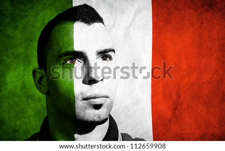 Italian flag painted on his face.