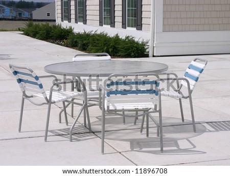 Outdoor furniture on cement patio
