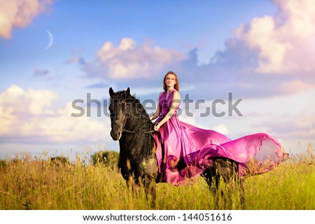 Beautiful Woman On A Horse With Long Pink Dress