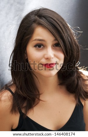 Portrait of pretty girl with back lighting