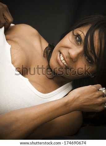 Sexy Black Woman  over Black Background