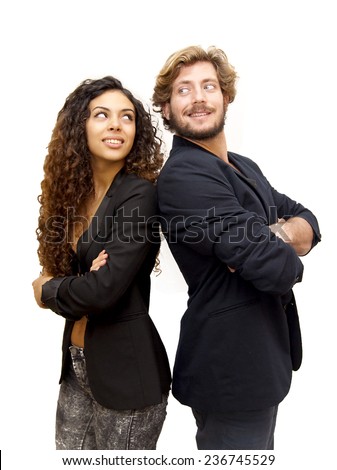 Beautiful portrait of a loving couple are back to back on white background