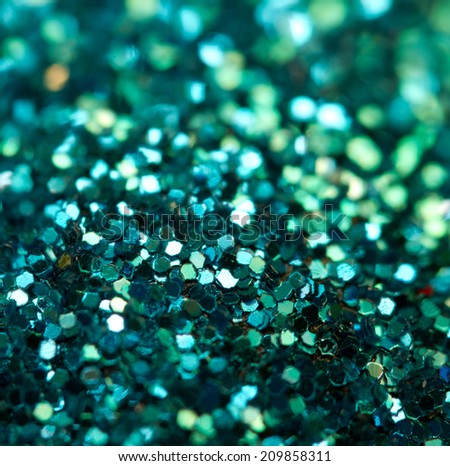Holiday shiny blurry turquoise background. Macro