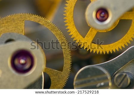 Background with metal cogwheels a clockwork.  For your successful business design. Macro.