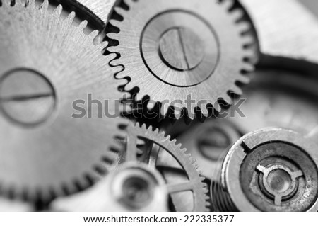 Black and white background with metal cogwheels a clockwork. Conceptual photo for your successful business design. Macro