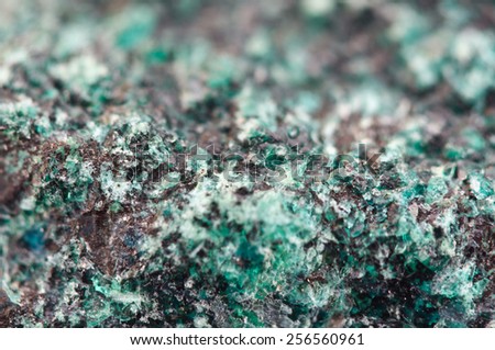 Chrysocolla is a hydrated copper cyclosilicate.Cyan (blue-green) crystal. Macro. Beautiful fantastic background for successful business projects and other Your variant.