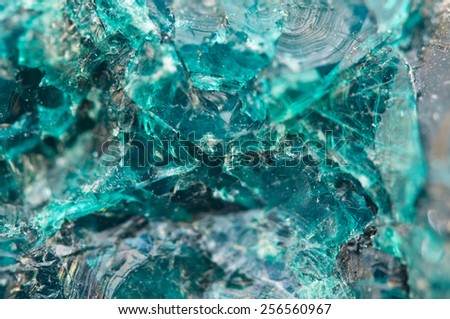 Chrysocolla is a hydrated copper cyclosilicate.Cyan (blue-green) crystal. Macro. Beautiful fantastic background for successful business projects and other Your variant.