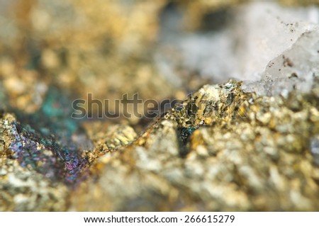 Chalcopyrite, It has the chemical formula (CuFeS2). Copper iron sulfide mineral. Macro. Beautiful fantastic background for successful projects.