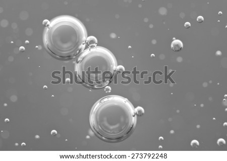 Macro Oxygen bubbles in water on black white background, concept such as ecology and other your successful projects