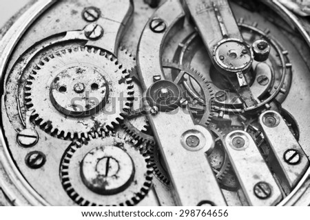 Black and White Metal Cogwheels Inside Oldest Clockwork. Conceptual photo for your successful business design. Macro