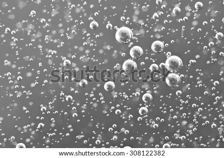 Black-and-white Macro Oxygen bubbles in wate,