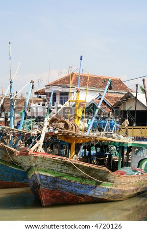 Traditional Indonesian boats in a poor village near Surabaya (Java)