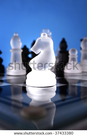 Chess knight-A game of chess comes to an end. The king is checkmated.